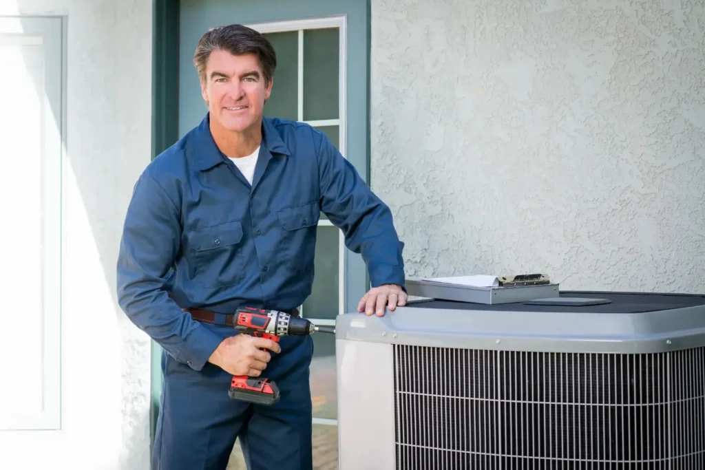 AC Repair In Livingston, TX 1 HVAC technician repairing an Outdoor AC Unit
